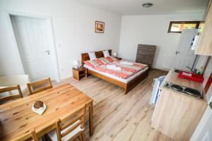 Postel nebo postele na pokoji v ubytování Dueta Apartment