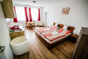 Postel nebo postele na pokoji v ubytování Dueta Apartment