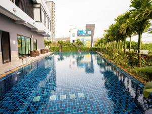 Swimmingpoolen hos eller tæt på Dusit Grand Condo View Jomtien By Snap Hosting