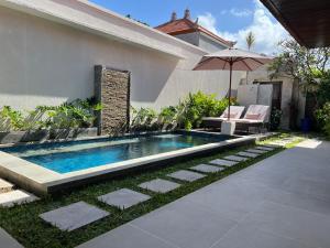 Πισίνα στο ή κοντά στο Kesari Haven Villa C