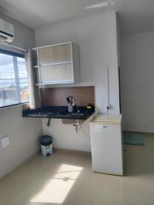 Η κουζίνα ή μικρή κουζίνα στο SunVale Loft