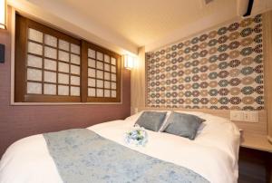 Postel nebo postele na pokoji v ubytování Hotel Opera