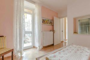 Łóżko lub łóżka w pokoju w obiekcie Casa Angela