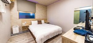 TV a/nebo společenská místnost v ubytování Beauty Garden Hotel - Jiaoxi