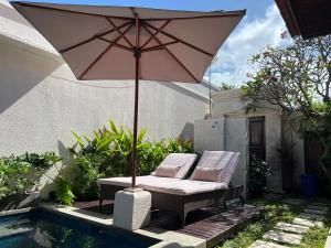 Πισίνα στο ή κοντά στο Kesari Haven Villa C