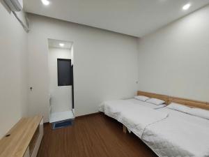 Postel nebo postele na pokoji v ubytování Villa Lối Nhỏ