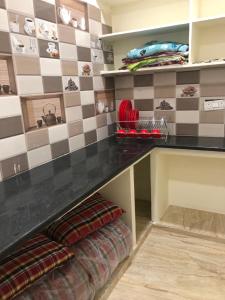 Kuchyň nebo kuchyňský kout v ubytování Chinmayi Guest Suite