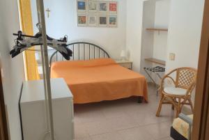 Postel nebo postele na pokoji v ubytování Appartamenti in Centro a Vieste