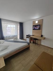 Postel nebo postele na pokoji v ubytování Hotel Gloria