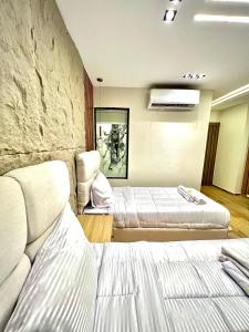 Voodi või voodid majutusasutuse Pyramids moon Tower toas