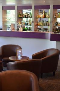 
The lounge or bar area at Mercure Besancon Parc Micaud
