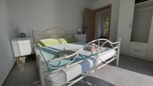 Postel nebo postele na pokoji v ubytování Apartments Dario