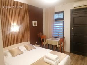 Postel nebo postele na pokoji v ubytování Petkov Family Hotel