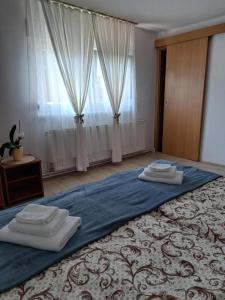 Una cama o camas en una habitación de EXIT Apartment