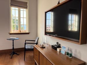 Virtuve vai virtuves zona naktsmītnē Xiamen Gulangyu Bishan Residence