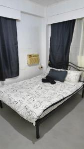 Ένα ή περισσότερα κρεβάτια σε δωμάτιο στο Kitten's Corner Bed & Breakfast