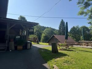 Vonkajšia záhrada v ubytovaní Penzion Pohádka