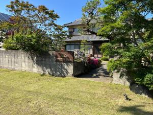 En hage utenfor Guest Room Kanda