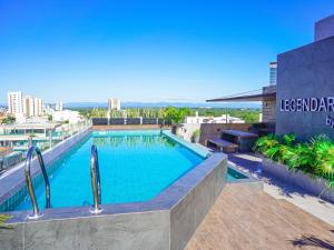a swimming pool on the roof of a building at Modern Studio Equipetrol in Santa Cruz de la Sierra