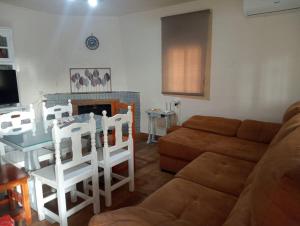 a living room with a couch and a table at La Casa de la Abuela 
