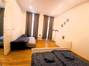 Posteľ alebo postele v izbe v ubytovaní Pat & Mat Apartment