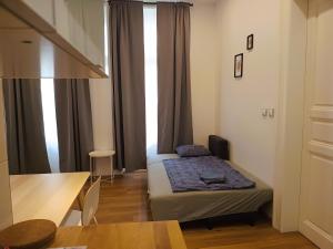 Posteľ alebo postele v izbe v ubytovaní Pat & Mat Apartment
