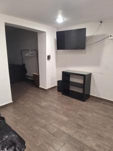 TV a/nebo společenská místnost v ubytování Casa Sol Central