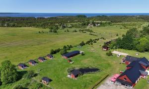 an aerial view of a farm with a group of houses at Ratturi talu in Reigi
