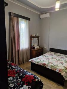 Postel nebo postele na pokoji v ubytování Joni Guest House + 18 fotografií