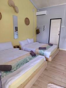 Postel nebo postele na pokoji v ubytování Tamu Chalet + 28 fotografií