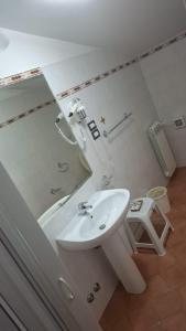 Koupelna v ubytování Hotel Savoia