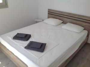 Postel nebo postele na pokoji v ubytování Liopi Village Andros