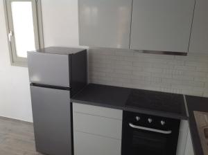Kuchyň nebo kuchyňský kout v ubytování Liopi Village Andros
