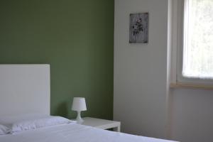 Postel nebo postele na pokoji v ubytování B&B Terra del Sole