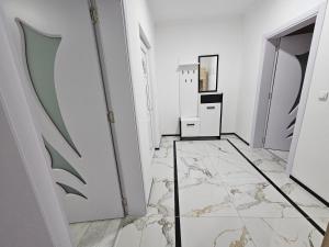 Kuchyň nebo kuchyňský kout v ubytování Rejjan APARTMANI