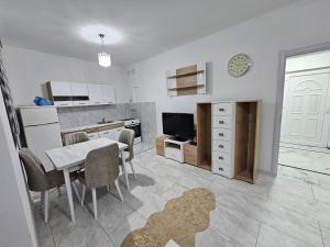 Kuchyň nebo kuchyňský kout v ubytování Rejjan APARTMANI + 19 fotografií