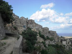 a stone building on top of a mountain at Enjoy Badolato! in Badolato