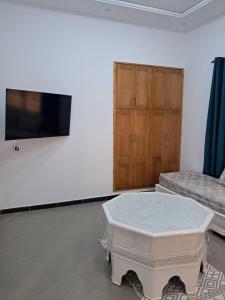 TV a/nebo společenská místnost v ubytování Jolie villa familiale avec piscine privée