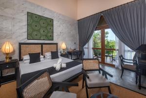 Postel nebo postele na pokoji v ubytování Ceylon Breeze Sigiriya
