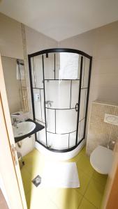 Koupelna v ubytování Hotel Tesla