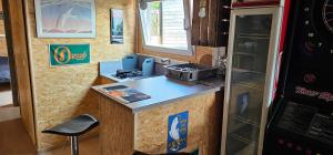 a small kitchen with a counter in a food truck at Flips et mousse in Gembloux