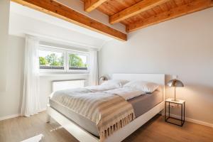 Ένα ή περισσότερα κρεβάτια σε δωμάτιο στο 2019 Hygge Nest Whg 3 +7 φωτογραφίες
