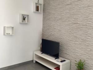 TV a/nebo společenská místnost v ubytování Casinha da Bia - Gerês