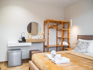 Postel nebo postele na pokoji v ubytování Ion Rooms