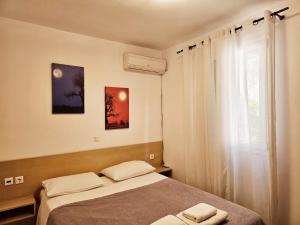 Posteľ alebo postele v izbe v ubytovaní Corfu Dream Holidays Villas