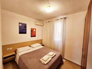 Postel nebo postele na pokoji v ubytování Corfu Dream Holidays Villas