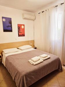 Postel nebo postele na pokoji v ubytování Corfu Dream Holidays Villas