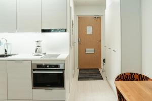 Η κουζίνα ή μικρή κουζίνα στο Time Apartments Ylistönmäki