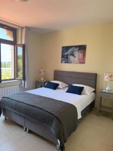 Postel nebo postele na pokoji v ubytování Apartments Villa Dinka