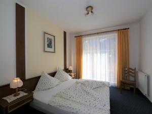 Posteľ alebo postele v izbe v ubytovaní Apartment in Bichlbach at the lake